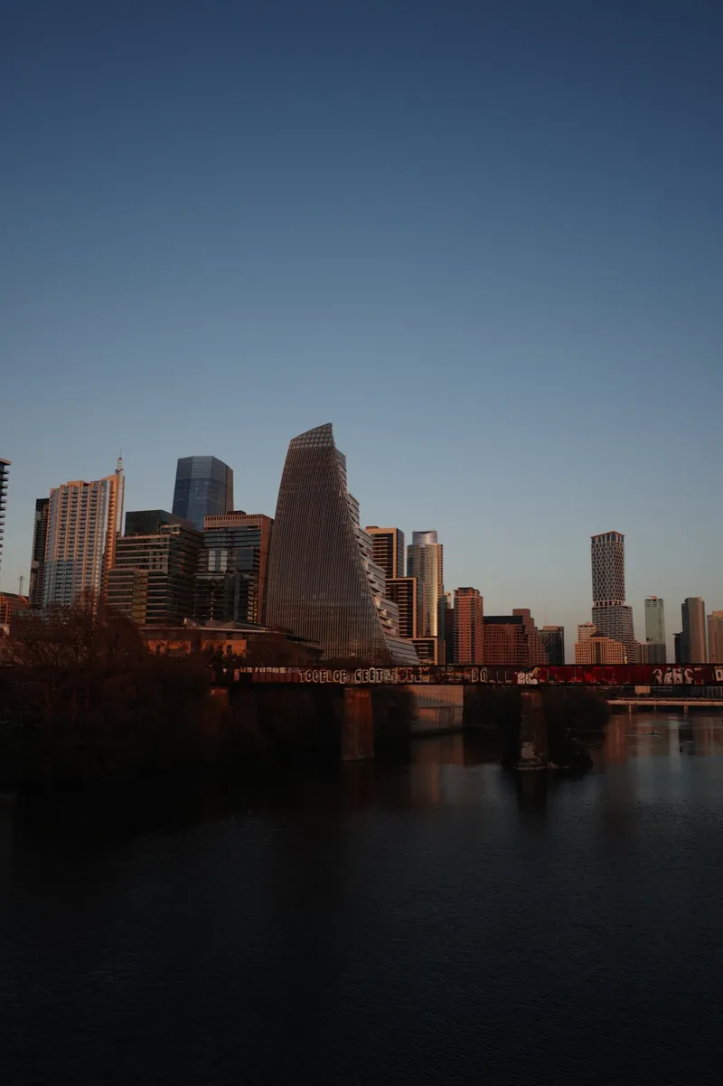 Downtown Austin skyline at dusk from the Town Lake bike trail